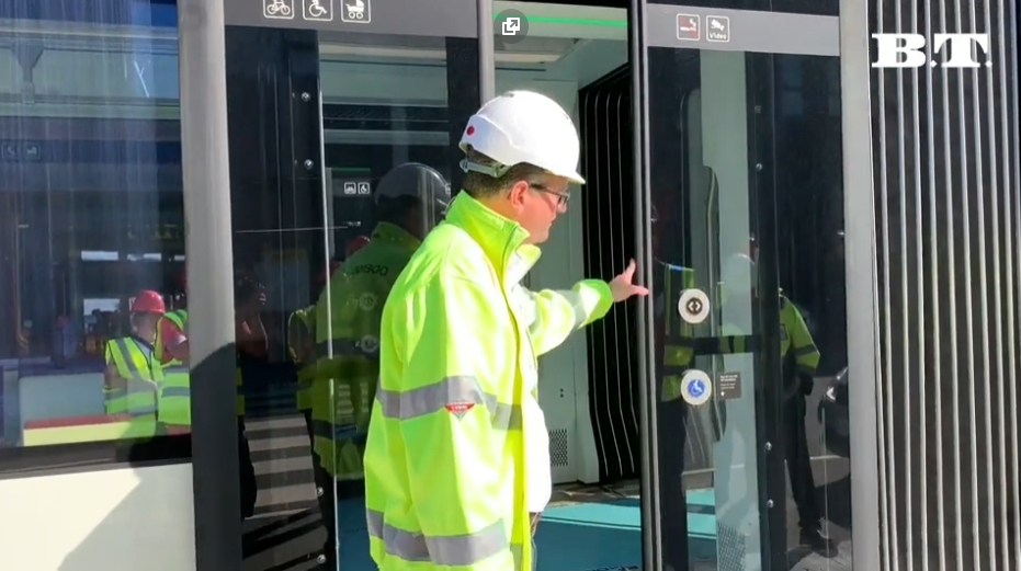 Operator in a train entrance public transport